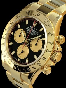 Rolex Cosmograph Daytona (YG / Black-Gold / YG) 116528