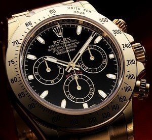 Rolex Cosmograph Daytona (YG / Black / YG) 116528