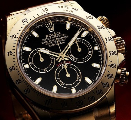 Rolex Cosmograph Daytona (YG / Black / YG) 116528